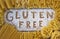 Gluten free word with wood background