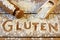 Gluten word with wood background