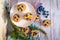 Glutenfree almond flour blueberry muffins on white plate and wooden background