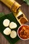 Glutinous rice is wrapped with lerek or banana leaf encased in bamboo culm and cooked in open fire / Lemang / A must have in every