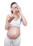 Glutton pregnant woman over white