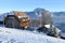 The Gmundnerberg Haus on the Gmundnerberg in winter with the Traunstein and Traunsee in the background, Austria, Europe
