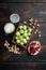 Gnarly garlic brussels ingredients, on old wooden table, top view