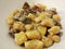 Gnocchi with champignons, cream and bacon