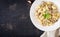 Gnocchi with a mushroom cream sauce and parsley in bowl