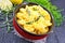 Gnocchi pumpkin with lemon in bowl on dark board