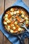 Gnocchi with vegetables and mushrooms. Potato dumplings with carrot, scallions & mushrooms
