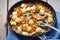 Gnocchi with vegetables and mushrooms. Potato dumplings with carrot, scallions & mushrooms