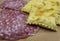 Gnocco fritto or Crescentine with slices of salami, traditional italian food from Modena or Bologna, Italy
