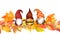 Gnomes family in autumn leaves. Watercolor seamless natural frame. Beautiful seasonal decorative horizontal border with