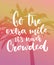 Go the extra mile, it`s never crowded. Motivation quote about progress and dreams on pink vintage background with palm