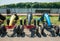 Go-karts with pedals and wheels for rent.. Many aligned colored carts