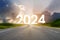 Go to the New Year 2024. Happy New Year greeting card 2024, Happy New Year 2024 letters on the highway road in the destination of