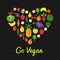 Go vegan design. Healthy food concept. Heart shape filled with collection of fresh healthy fruits and vegetables