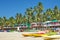 Goa beach Palolem India, colorful bungalows under the palm tree