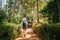 Goa, India. Young Backpacker Woman Walking Through Botanical Garden In Sunny Day