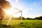 Goal football in the park with a sun light.