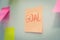 Goal. Post It. many colored sheets sticky note paper on white board background