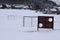 goal training wall and soccer field in snow