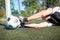 Goalkeeper with ball at football goal on field