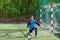 Goalkeeper catches the ball. Stadium goalie sports play ground game, grass soccer keeper man, outdoorsc ompetition,