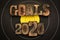 Goals 2020, phrase set with vintage letterpress printing blocks on archery target