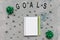 GOALS word and to do list on a gray and blue background