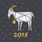 Goat Christmas paper on a dark gray background with the ball
