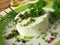 Goat cream cheese with herb marinade