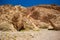 Gobi desert wilderness environment sand stone rocks and hills of Mongolia blue sky background