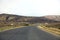 Gobustan near Baku, Azerbaijan. Asphalt road to Gobustan . Road in the desert - Gobustan Azerbaijan