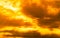 God light. Dramatic golden cloudy sky with sun beam. Yellow sun rays through  golden clouds. God light from heaven for hope and