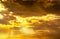 God light. Dramatic golden cloudy sky with sun beam. Yellow sun rays through  golden clouds. God light from heaven for hope and