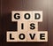 God is Love Spelled in Blocks on a Leather Holy Bible