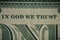 In God We Trust inscription on a dollar bill, macro