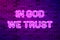 In God We Trust, the official motto of the United States of America glowing purple neon letters