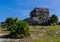 God of Winds Temple guarding Tulum`s sea entrance bay