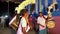 Goddess Durga is being worshiped by playing drums in the Puja festival