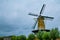 Goes, the netherlands, august 2019. In the countryside of the zealand region, a perfectly preserved and functioning windmill.