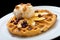 Gofre - belgian homemade waffles with ice cream, bananas and nuts