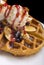 Gofre - belgian homemade waffles with ice cream, bananas and nuts