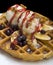 Gofre - belgian homemade waffles with ice cream, bananas and nuts