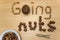 `Going nuts` with peanuts, walnuts, coconut, nut cracker and plate