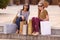 Going shopping with my girl...Two attractive young woman with their shopping bags after a day of retail therapy.