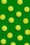 Are we going to get used already. High angle shot of a group of tennis balls placed together in formation on top of a