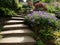 Going up the garden staircase with wide steps and geranium bushes around