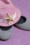 Going on vacation on the beach. Hat for protection from the sun. Beach sneakers and Starfish. Against the background of a beach to