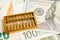 Gold abacus on Euro banknote money, economy finance exchange trade investment concept