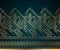 Gold art deco seamless border on dark turquoise background