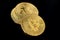 Gold Bitcoin coins on black background. Three gold bitcoin coins. Bitcoin close up. Golden bitcoins. Cryptocurrency.